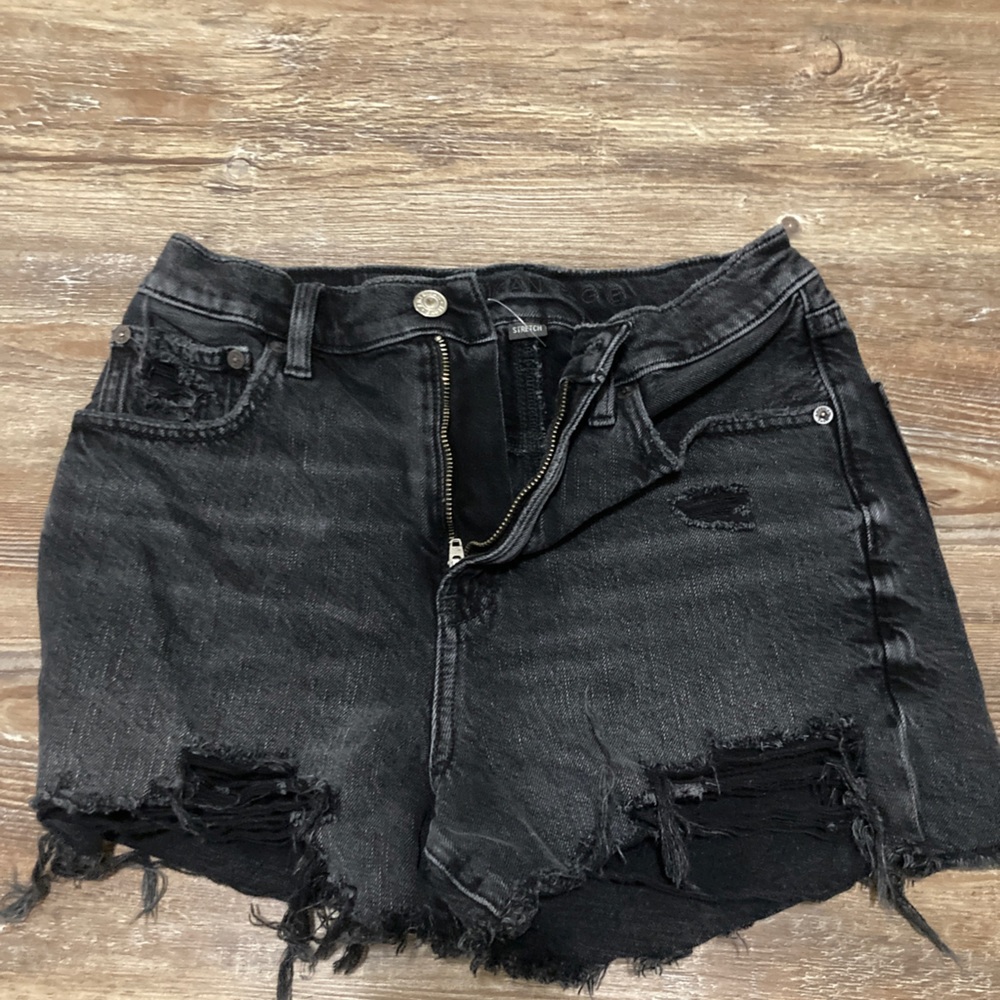 Black Jean shorts with a little styling rips, not to short, good quality